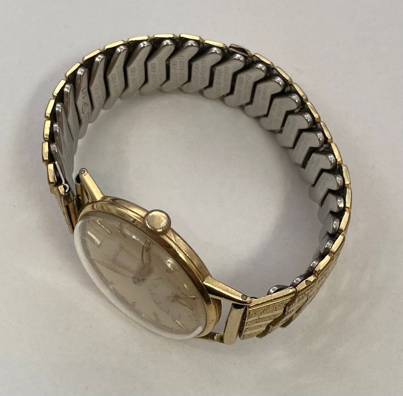 14 k Gull Tissot med strekklenke